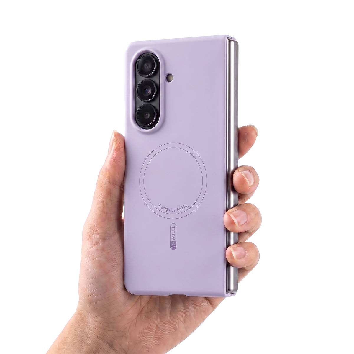 Hand holding a Galaxy Z Fold in the Purple Apex M3 case, showing its slim in-hand feel